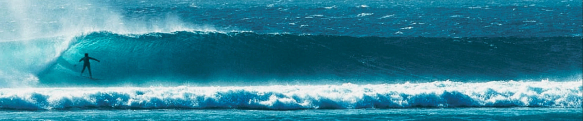 How can The Surfboard Warehouse offer high-quality boards at such low prices?